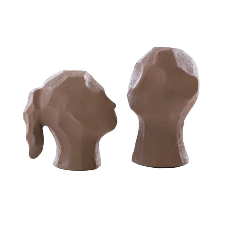 Benedict og Amal skulptur, Earth Cooee Design