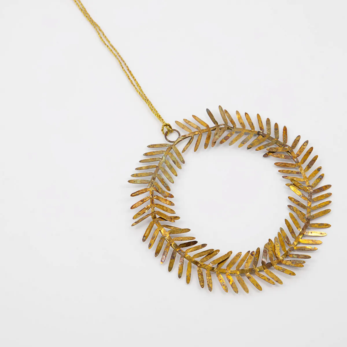 Lamet juleophæng krans, Messing House Doctor