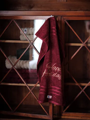 Happy Holidays håndklæde 50x70 cm - Rød - Lexington