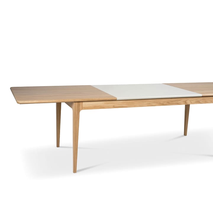 Höllviken spisebord, eg hvidpigmenteret matlak, 2 ilæg, beige MDF á 50 cm Mavis