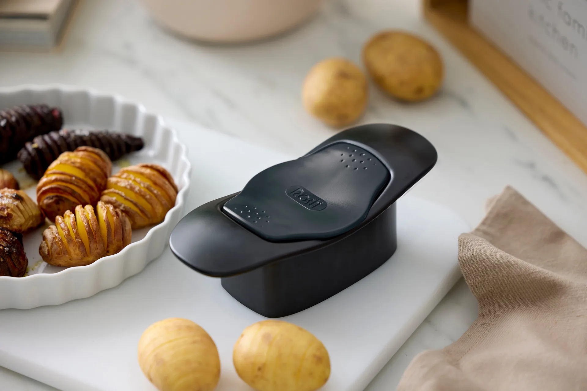 Classic hasselbackskærer, Sort Rosti