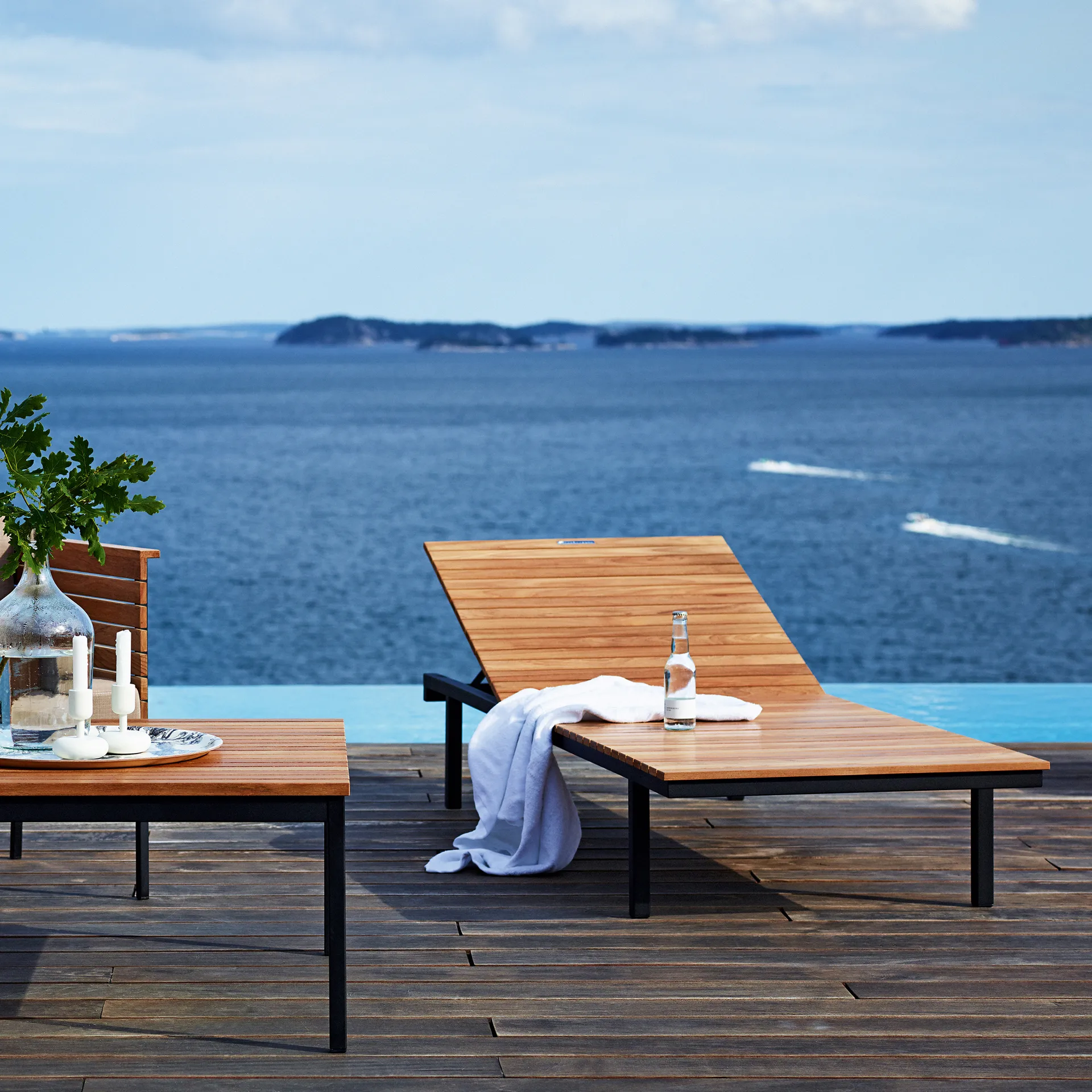 Häringe sofabord, Teak, large, sort stålstativ Skargaarden