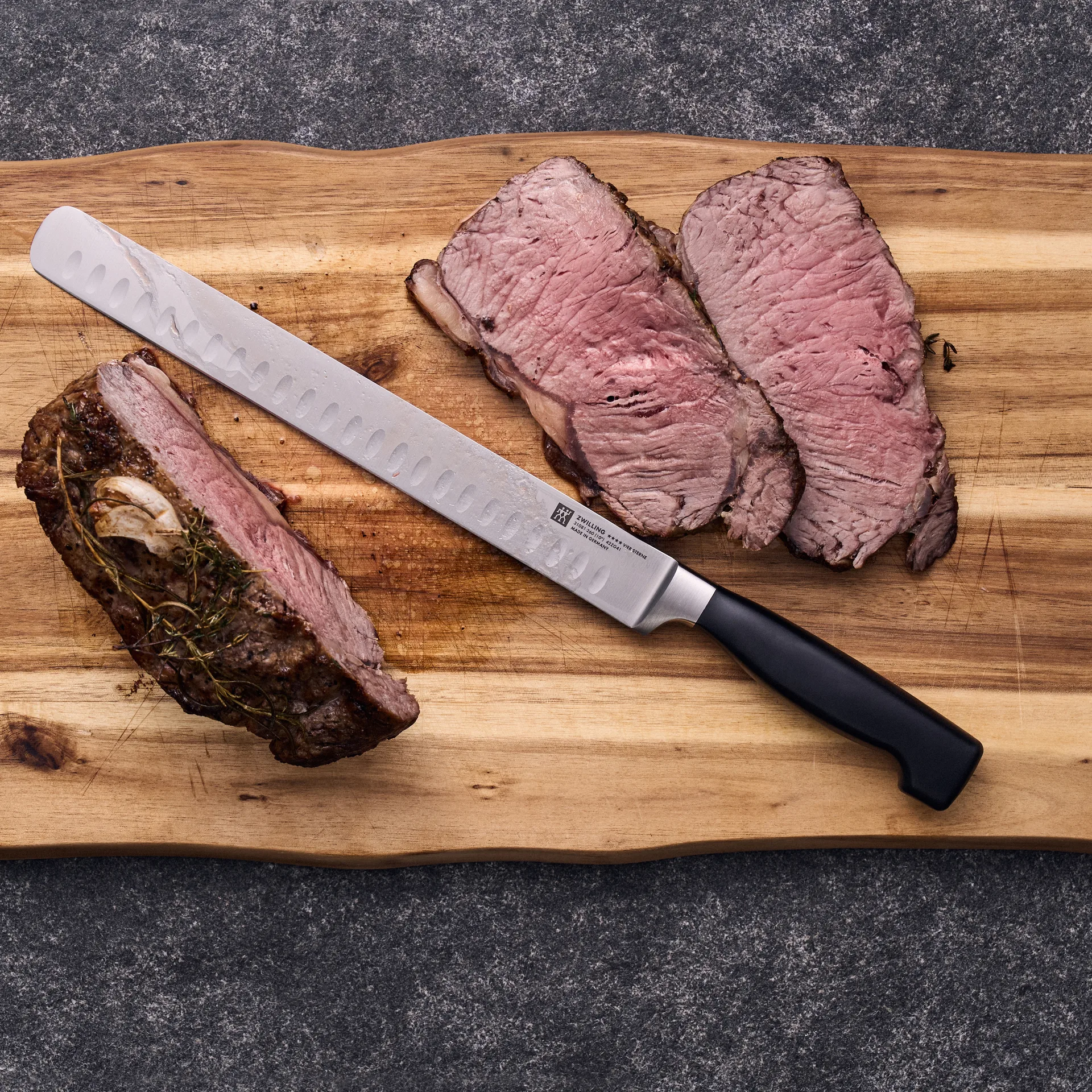 Zwilling Four star filet/trancherkniv 26 cm, Sort-rustfrit stål Zwilling