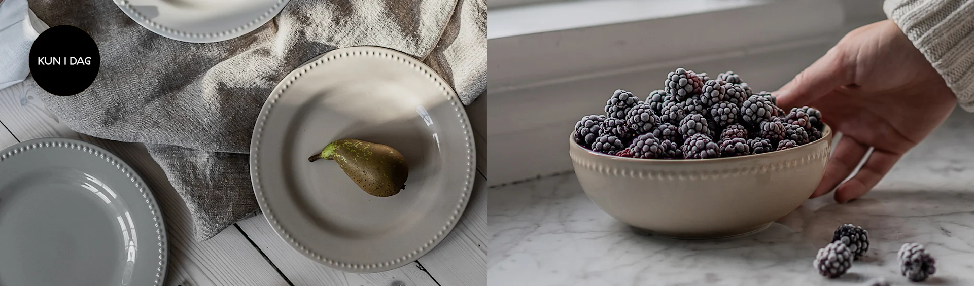 Creme og grå tallerkener med perlekant og en pære, samt en skål med frosne brombær holdt af en hånd. Kun i dag.